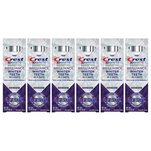 Six boxes of Crest 3D White Brilliance Pro Enamel Protect Toothpaste (3oz each), arranged in a row, showcase the enamel safe formula for effective teeth whitening. This 6 pack highlights the trusted Crest brand.